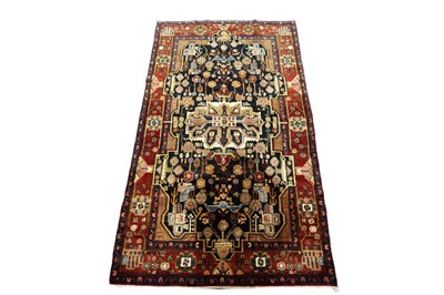 Lot 129 - A Persian hand-knotted Nahavand carpet