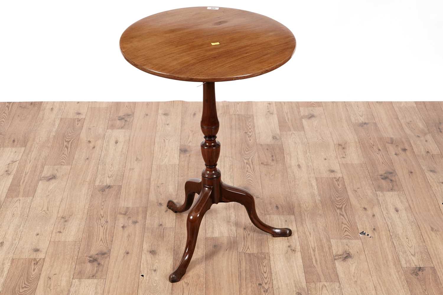 Lot 448 - A 19th Century mahogany tripod table