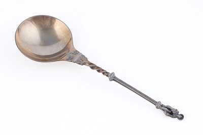 Lot 10 - A Victorian cased pair of silver parcel-gilt fruit serving spoons and matching sugar sifter spoon