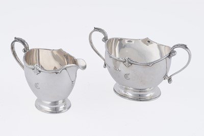 Lot 12 - A George V silver three-piece tea service