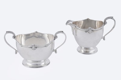 Lot 12 - A George V silver three-piece tea service