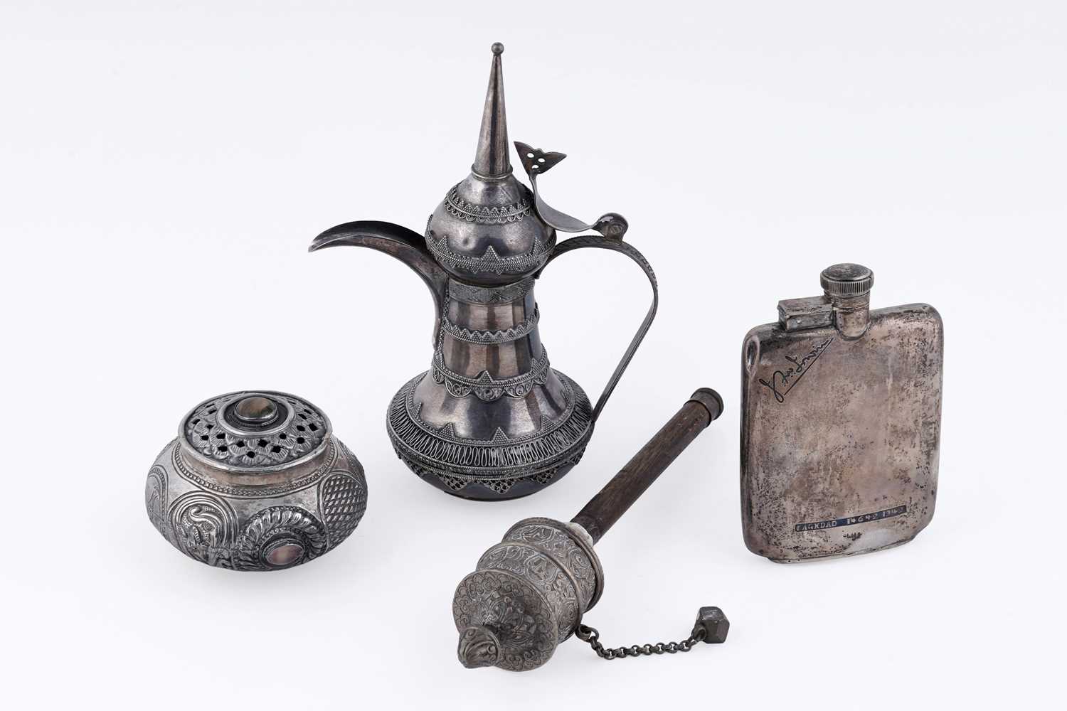 Lot 27 - A late 20th Century Omani silver coffee pot; and other items
