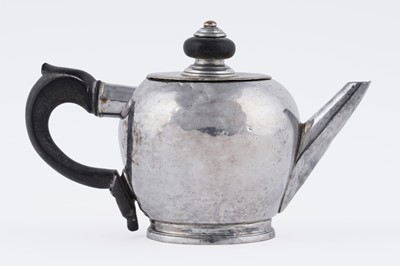 Lot 73 - A rare George I/II West Country silver miniature or herb teapot