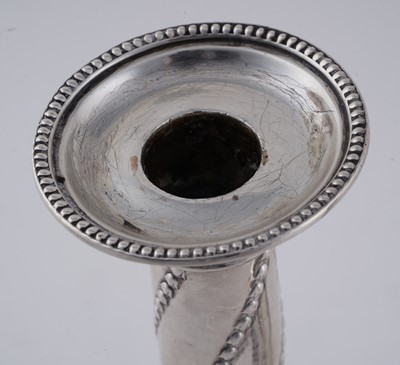 Lot 104 - A pair of late Victorian silver candlesticks