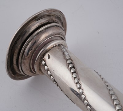 Lot 104 - A pair of late Victorian silver candlesticks