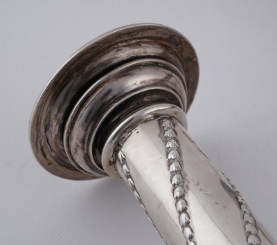 Lot 104 - A pair of late Victorian silver candlesticks