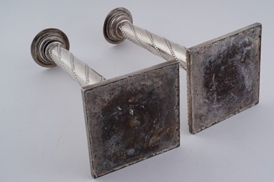 Lot 104 - A pair of late Victorian silver candlesticks