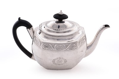 Lot 105 - A George III silver teapot of shaped octagonal form