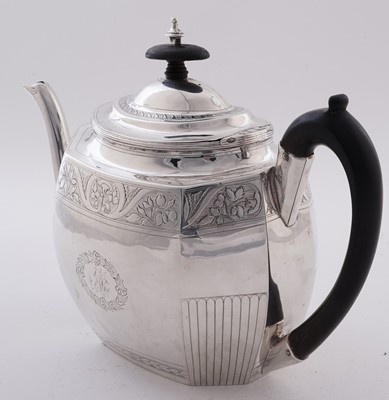 Lot 105 - A George III silver teapot of shaped octagonal form