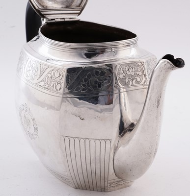 Lot 105 - A George III silver teapot of shaped octagonal form