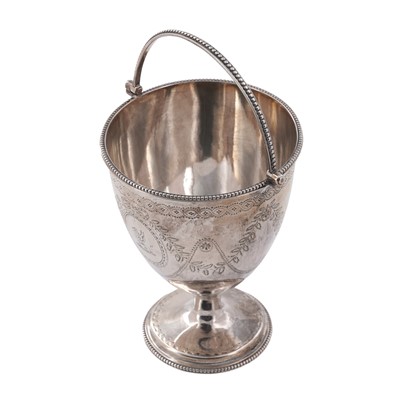 Lot 38 - A George III Silver swing handled sugar antique vase