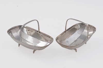 Lot 107 - A pair of George V silver novelty bonbon dishes