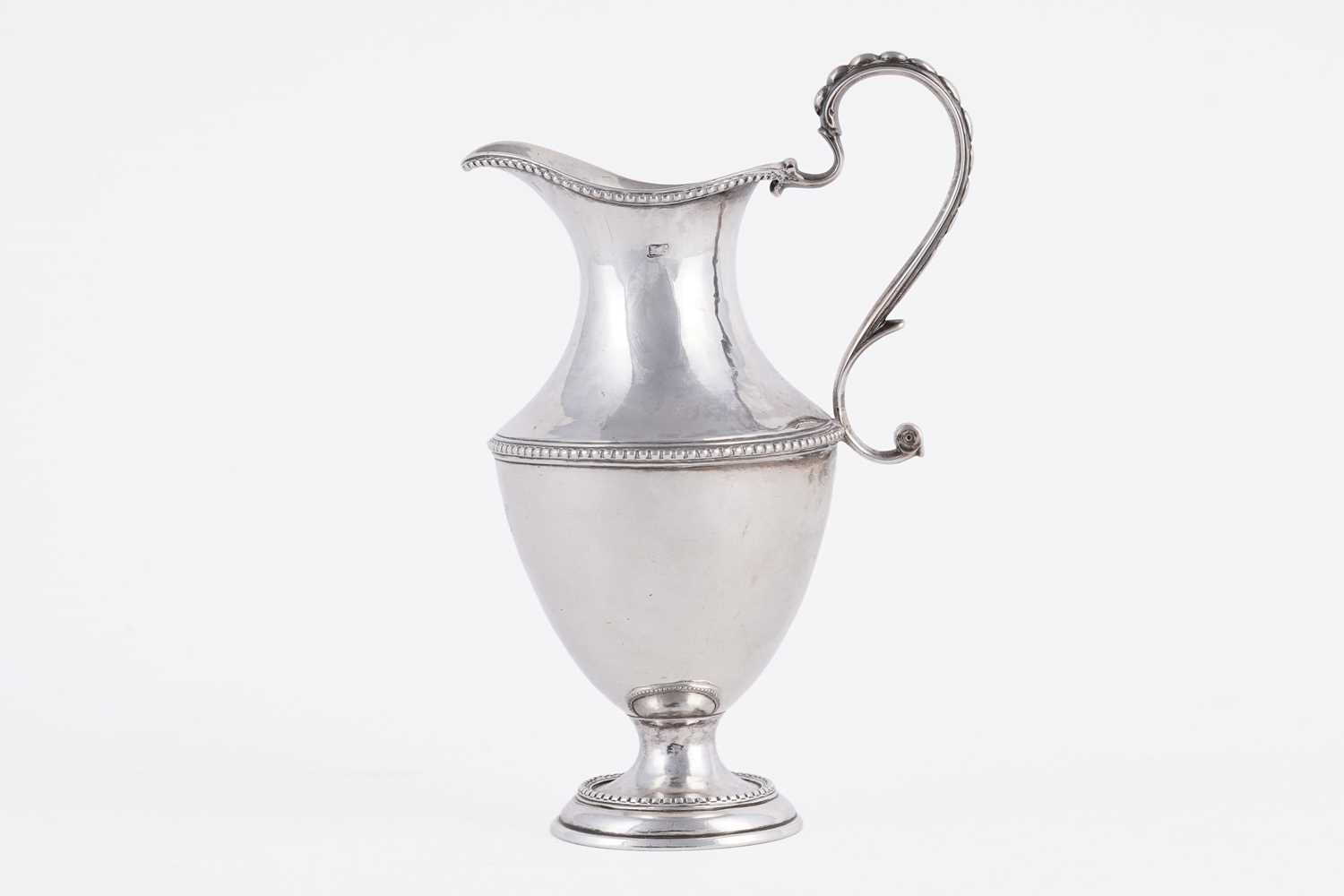 Lot 57 - A Scottish provincial silver cream jug