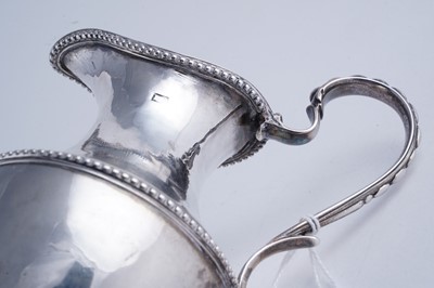 Lot 57 - A Scottish provincial silver cream jug