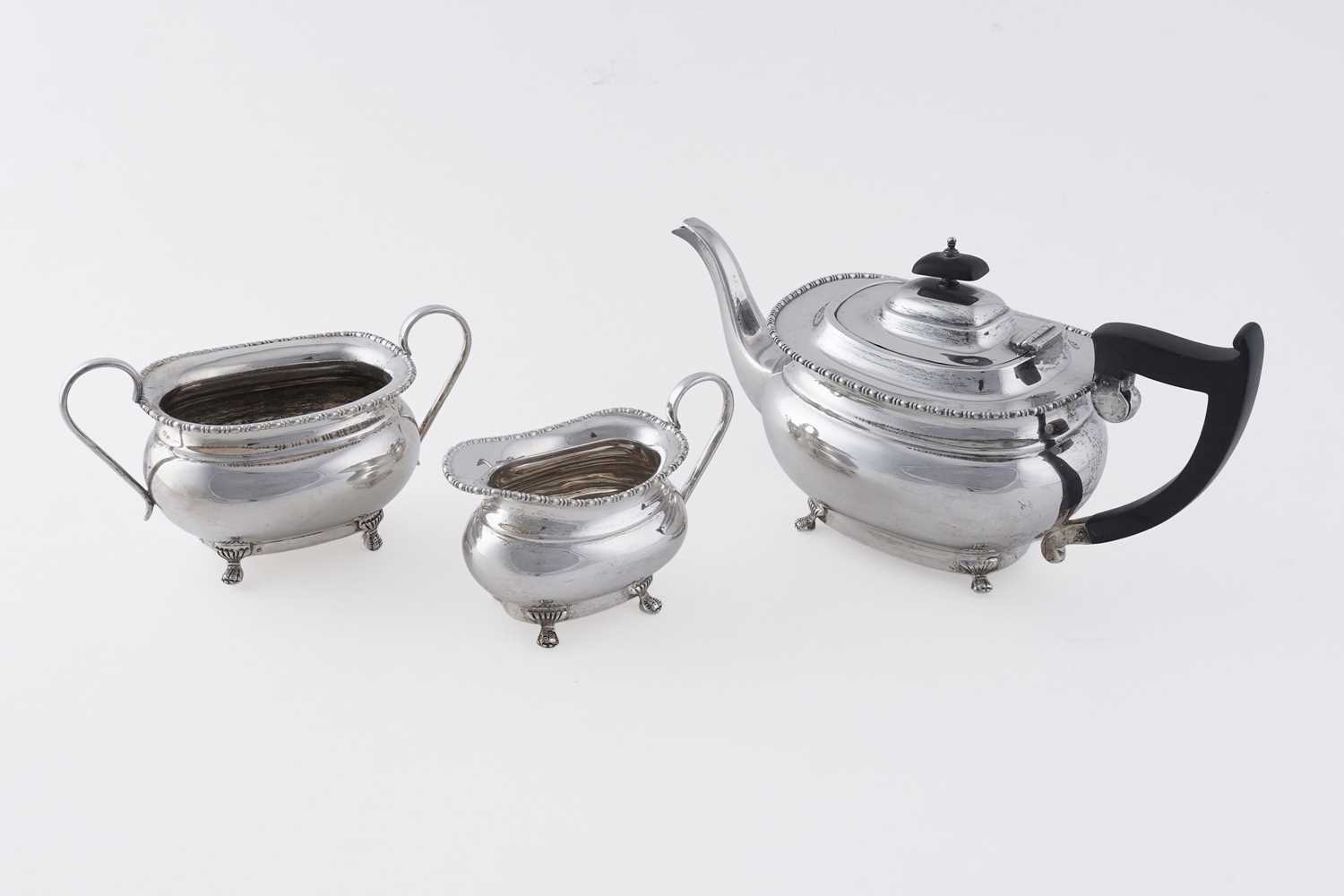 Lot 13 - A George V silver three-piece tea set