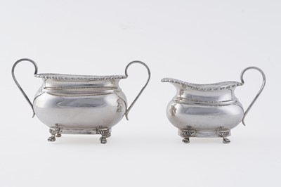 Lot 13 - A George V silver three-piece tea set