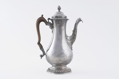 Lot 84 - An early George III silver coffee pot of baluster form