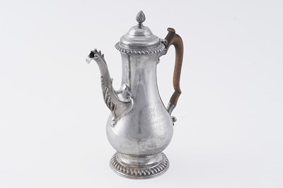 Lot 84 - An early George III silver coffee pot of baluster form