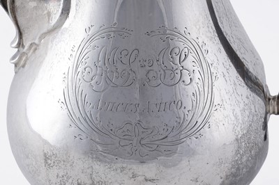 Lot 84 - An early George III silver coffee pot of baluster form