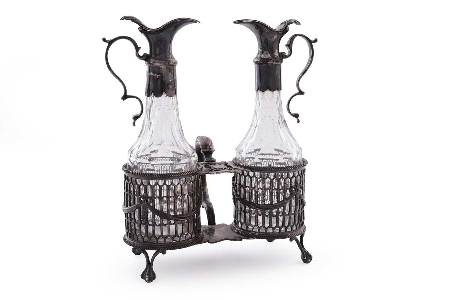 Lot 109 - A George III silver oil and vinegar frame