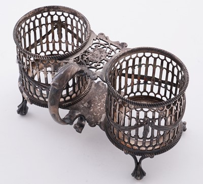 Lot 109 - A George III silver oil and vinegar frame