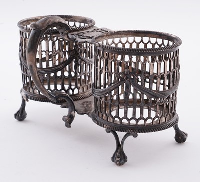 Lot 109 - A George III silver oil and vinegar frame