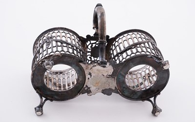 Lot 109 - A George III silver oil and vinegar frame
