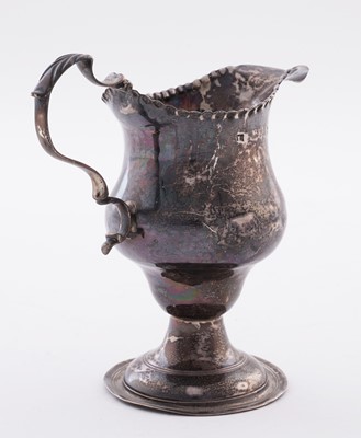 Lot 110 - A George III silver cream jug