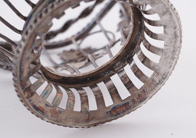 Lot 111 - A George III silver wirework sugar basket