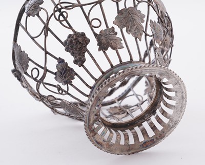 Lot 111 - A George III silver wirework sugar basket