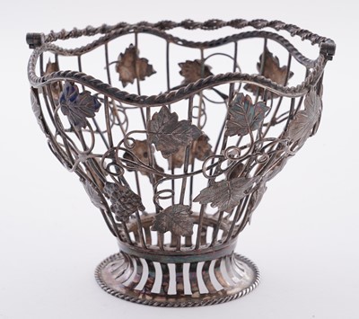 Lot 111 - A George III silver wirework sugar basket
