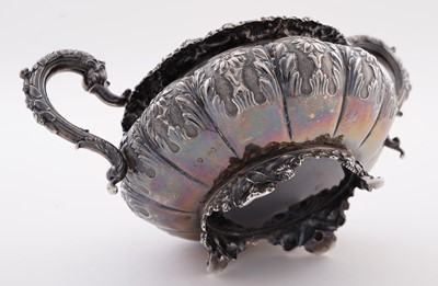 Lot 115 - A late George IV silver three-piece tea service