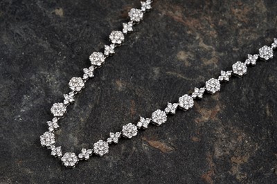 Lot 540 - A diamond line necklace