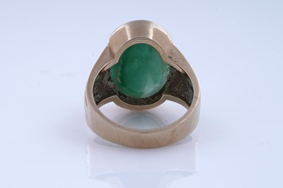 Lot 76 - A modern jade Streamline style signet ring