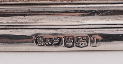 Lot 5 - A pair of George V silver candlesticks