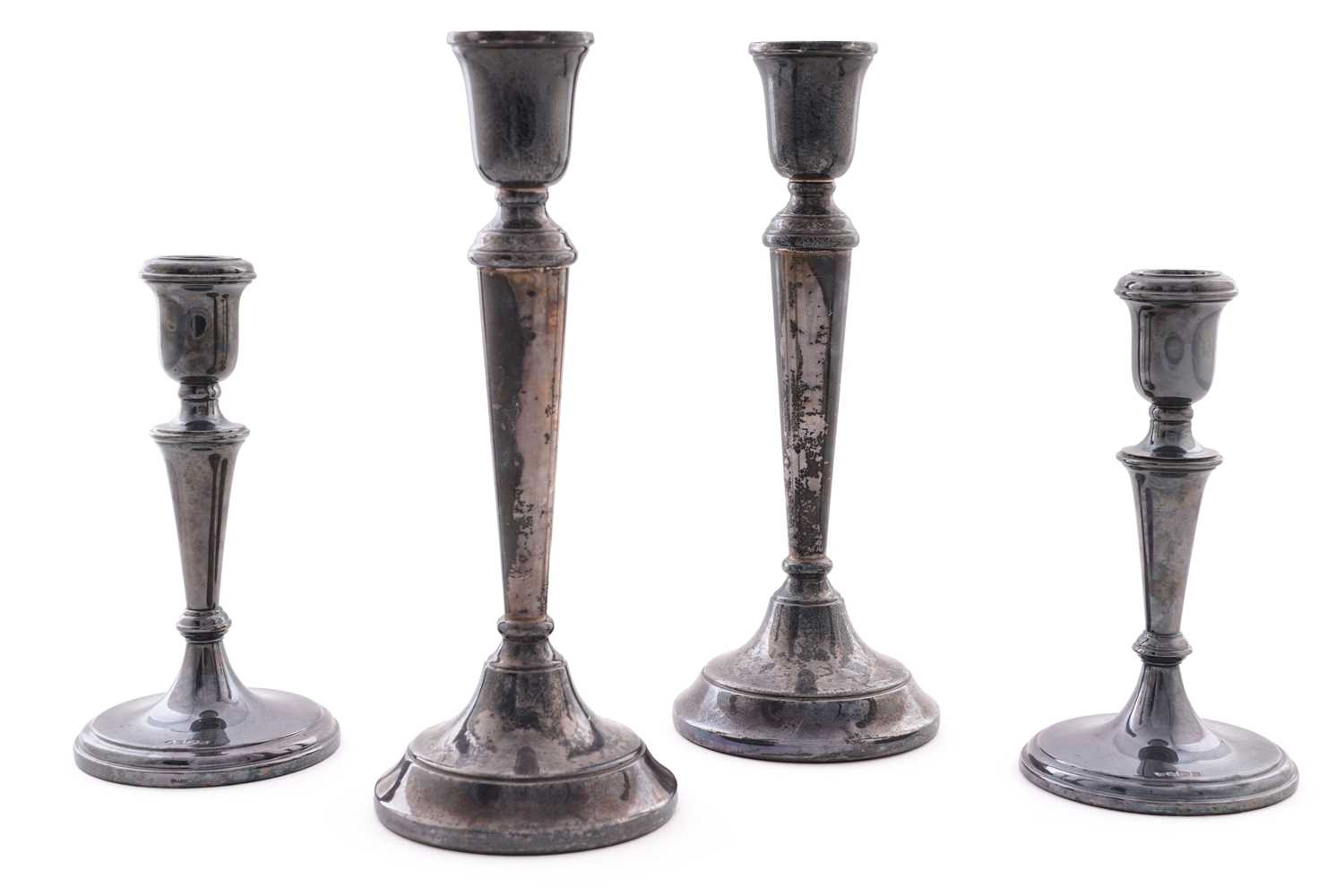 Lot 2 - Two pairs of silver candlesticks