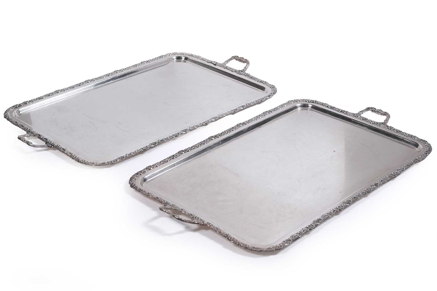 Lot 23 - A pair of large plated two-handled tea trays