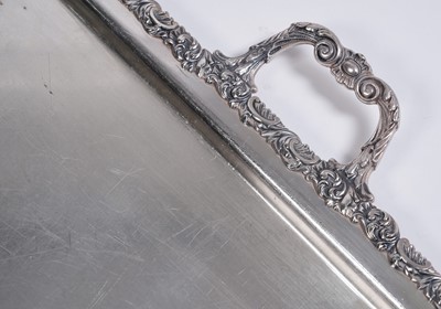 Lot 23 - A pair of large plated two-handled tea trays