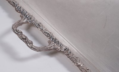 Lot 23 - A pair of large plated two-handled tea trays