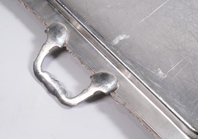 Lot 23 - A pair of large plated two-handled tea trays