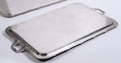 Lot 23 - A pair of large plated two-handled tea trays