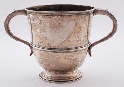 Lot 88 - A George V silver two handled cup of campana form