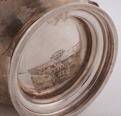 Lot 88 - A George V silver two handled cup of campana form