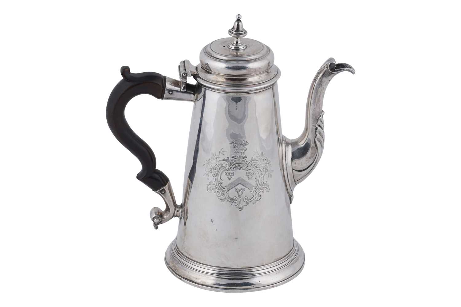 Lot 80 - A George II silver coffee pot of tapering form on a skirted base
