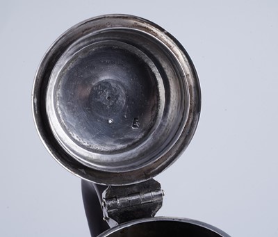 Lot 80 - A George II silver coffee pot of tapering form on a skirted base