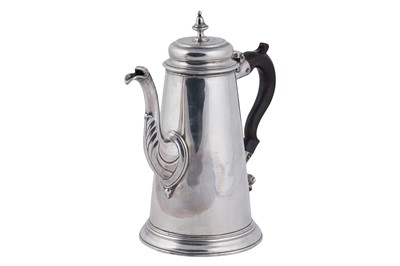 Lot 80 - A George II silver coffee pot of tapering form on a skirted base