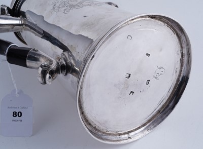 Lot 80 - A George II silver coffee pot of tapering form on a skirted base