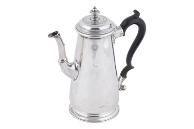 Lot 82 - A George II silver coffee pot
