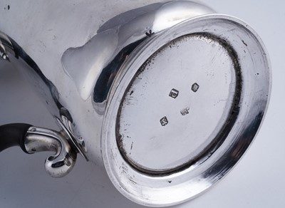 Lot 82 - A George II silver coffee pot