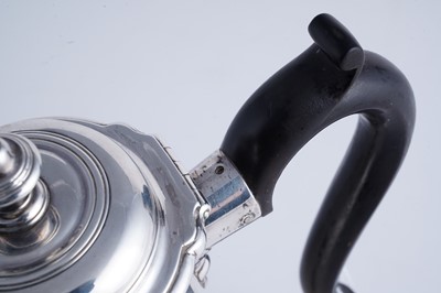 Lot 82 - A George II silver coffee pot